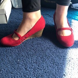 Cute red wedges heels.